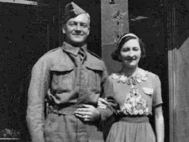 John Ernest Brown and Gladys Edith Brown outside shops in Plynlimmon Road