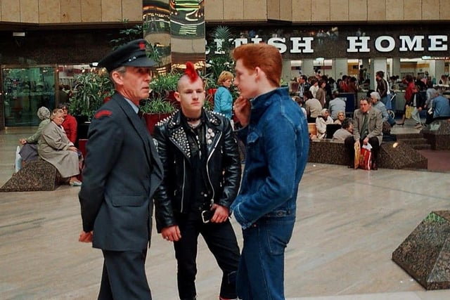 Do you recognise the man talking to the security guard in this picture?