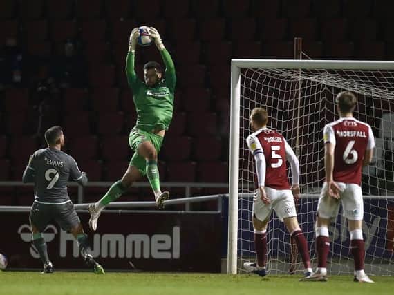 Steve Arnold comes out to claim a cross en route to his first clean sheet of the season against Fleetwood Town on Tuesday. Pictures: Pete Norton