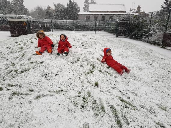 Sliding in the snow at Ruskington Chestnut Street School.