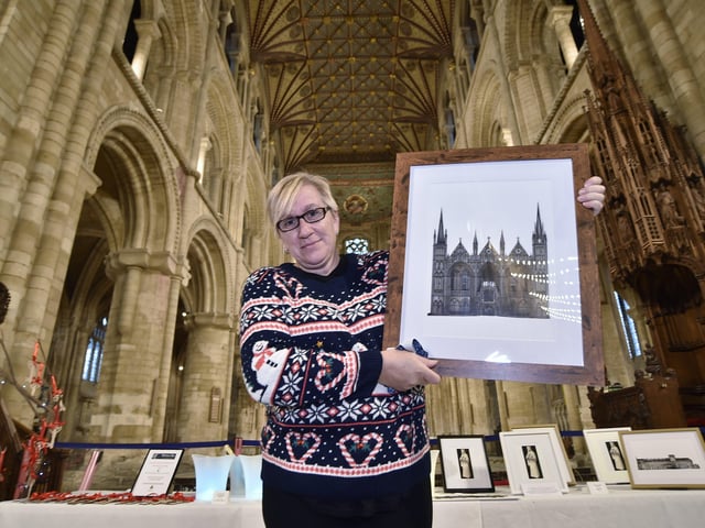 Peterborough Cathedral Christmas market. Rob Marsden from OliveOlive from Woodhurst EMN-200412-122400009