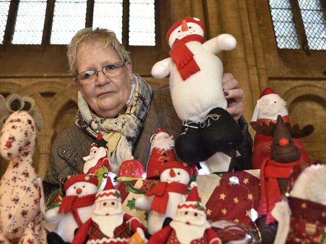 Peterborough Cathedral Christmas market. Rob Marsden from OliveOlive from Woodhurst EMN-200412-122400009