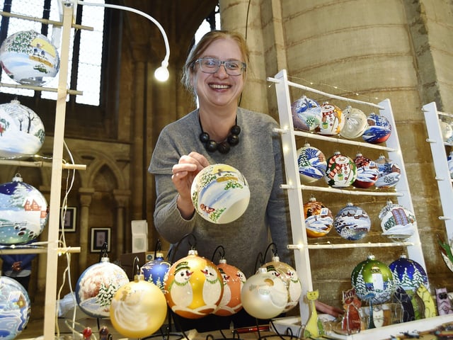 Peterborough Cathedral Christmas market. Rob Marsden from OliveOlive from Woodhurst EMN-200412-122400009