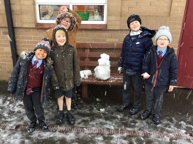 Snow and smiles at William Alvey School.