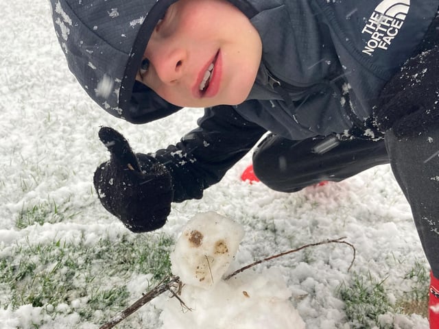 Teeny snowman or giant child at William Alvey School.
