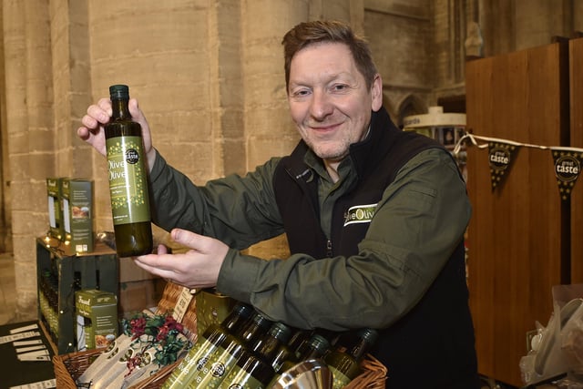 Peterborough Cathedral Christmas market.  Rob Marsden from OliveOlive from Woodhurst EMN-200412-122400009