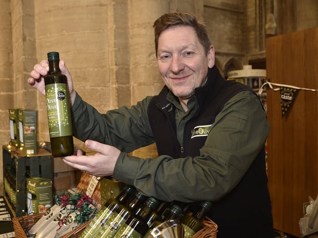 Peterborough Cathedral Christmas market. Rob Marsden from OliveOlive from Woodhurst EMN-200412-122400009