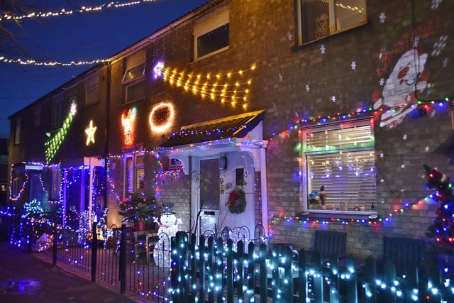 Christmas lights at The Dell, Woodston at the homes of the Merritt, Howson, Balentine and Coles families