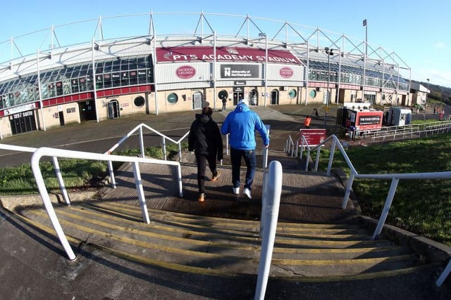 A smattering of Cobblers supporters make the walk down to the stadium for the first time in nine months.