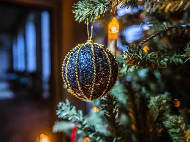 See the giant Christmas tree sat at the bottom of a sweeping staircase.
