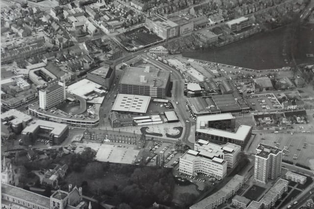 I wonder if anybody can date this picture of the city centre? The area has changed significantly but paradoxically remains very recognisable .
There are several clues –  it was taken before the Central Library was built on Broadway next to the old Sheltons building and the Hereward Cross Centre was in place. Other landmarks are St Mary’s flats, the Passport Office and, in the middle of the picture, the market. The recently demolished Northminster car park can be seen, although  Bayard Place had not yet been built.