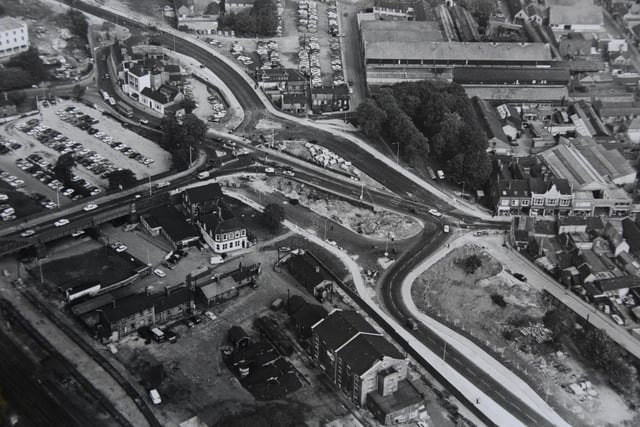 This is a splendid  aerial photograph of Peterborough  city centre showing work progressing on what would become the main route through the city, Bourges Boulevard. You can see  the top end of  Cowgate and, on the opposite side of the picture, Crescent Bridge. Work on the Queensgate centre has not yet begun and the old Perkins factory is still in place.