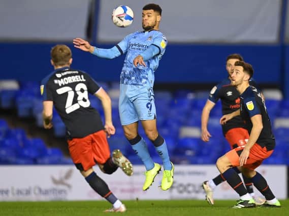 Luton's defence keep Coventry attacker Max Biamou under close attention during their goalless draw on Tuesday night