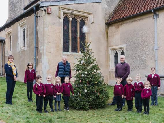 The vicar and churchwarden with children and headmistress from Great Gaddesden School (C) Sally Masson Photography