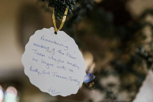 Messages left inside the church by some of the visitors who had added decorations to the tree (C) Sally Masson Photography