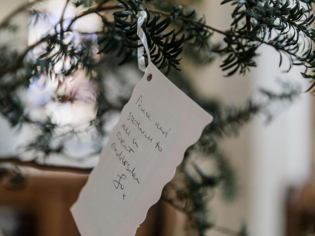 Messages left inside the church by some of the visitors who had added decorations to the tree (C) Sally Masson Photography