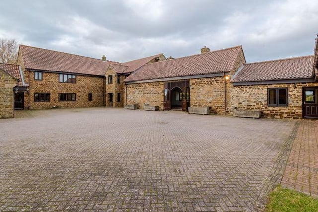 This five bedroom farm house on Back Lane in Hardingstone consists of over 11,000 square feet of accommodation. It boasts of a huge indoor swimming pool area, changing rooms, a hot tub, a sauna, two triple garages and a party room complete with a bar!