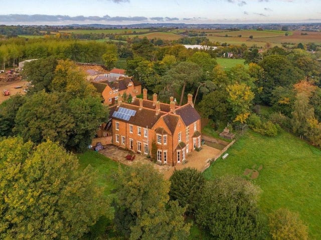 This site includes a detached two-storey Victorian farmhouse with established gardens and views across the countryside with an additional annexe, apartment and semi-detached cottage. It also includes commercial businesses including a farm shop, wood barn and firewood company, office accommodation, apple orchards and grazing land.
