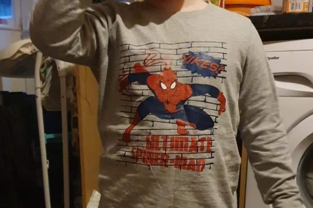 Jo Dann's son showing off his Spiderman outfit