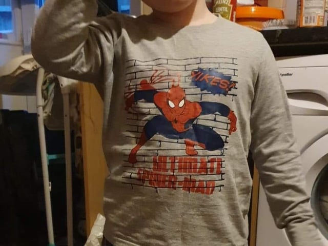 Jo Dann's son showing off his Spiderman outfit