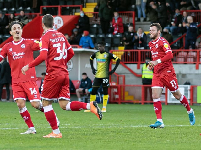 Tom Nichols celebrates Max Watters' first goal