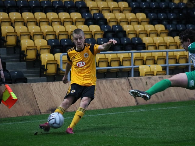 Terry Hawkridge gets a cross in. Photo: Oliver Atkin