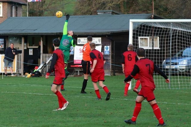 Action from Petworth's 3-2 win at East Dean in the West Sussex League / Picture: Roger Smith
