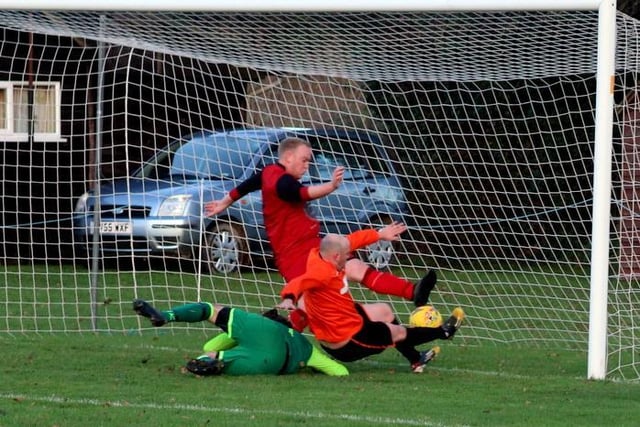 Action from Petworth's 3-2 win at East Dean in the West Sussex League / Picture: Roger Smith