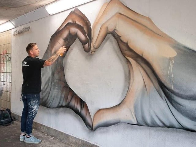 Nathan Murdoch - When he was painting his brilliant murals on city subways street artist Nathan Murdoch can’t have imagined it would bring worldwide fame. But his Taverners Road subway painting of a black and white hand struck a global chord with rap icon Ice T so impressed he shared the image to more than a million social media followers. The message of racial harmony was one all Peterborough could be proud of.