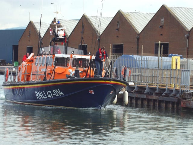 Saying farewell to the Tyne class lifeboat Lady Hermione Colwyn as she goes through the Shoreham locks for the last time on November 23, 2010. Picture: Gerald Thompson