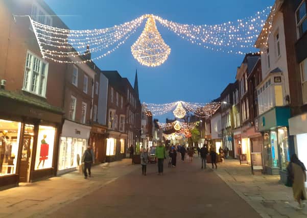 Christmas lights in East Street, Chichester SUS-201216-123550001
