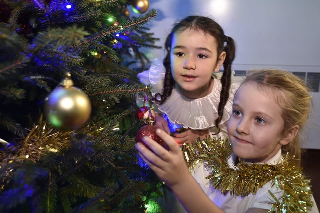 Reception pupils at Woodston Primary School celebrating Christmas.