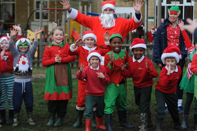 KS1 pupils taking part in their Christmas Smile run.