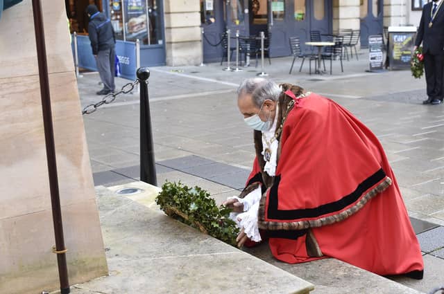Christmas Civic wreath laying ceremony at the Bridge Street war memorial. Mayor Gul Nawaz laying wreath EMN-201217-144201009