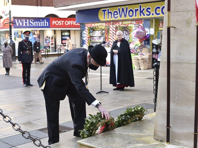 Christmas Civic wreath laying ceremony at the Bridge Street war memorial. Cllr Graham Casey laying wreath on behalf of the Royal British Legion. EMN-201217-144212009
