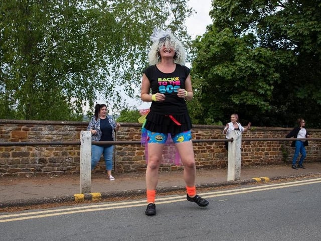At the height of the first lockdown, back in April, Michelle Lewis decided to beat the lockdown blues by dancing to ‘Reach’ by S Club 7 in her street. 
Neighbours in Hardingstone started to join her and the feel-good disco turned into a weekly event to help lift spirits in the village. 
Leotards and 80s disco costumes were even donned as the event progressed.
Photo: Kirsty Edmonds.