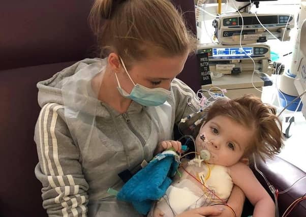 September: Mum Shannon holds Grayson Heagren. Shannon spoke to the Peterborough Telegraph after Grayson had a heart transplant earlier in the year