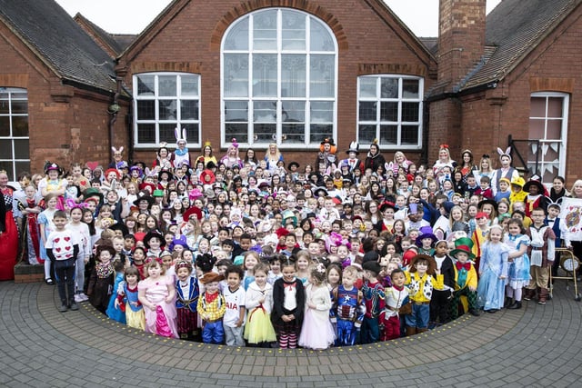 480 children from Kingsthorpe Grove Primary School put their usual blue uniforms to one side for the day so they could put on their favourite costumes and mimic characters from Lewis Carol's Alice in Wonderland for World Book Day.