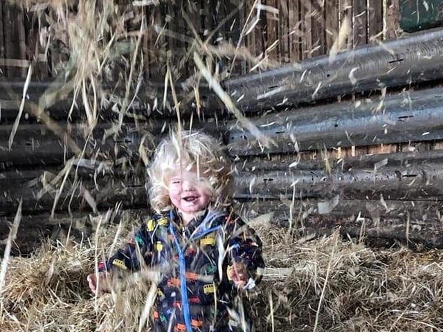 Freddie having fun in the straw
