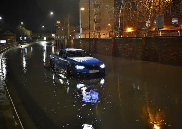 One diver found his car stranded on Bourges Boulevard.