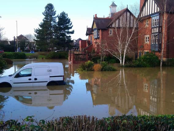 The car park of the Park House can be seen flooded