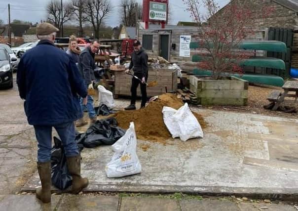 Management at the Tap & Kitchen restaurant in Oundle have appealed for sand as they try to protect the waterside restaurant from rising flood waters.