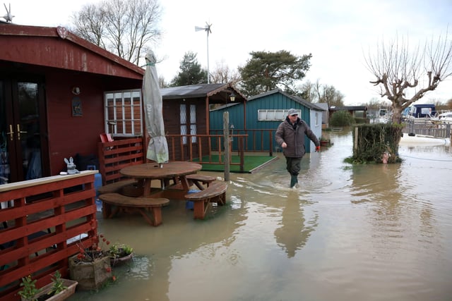 The River Nene has burst its banks in Peterborough damaging many waterside properties. Picture: Paul Marriott