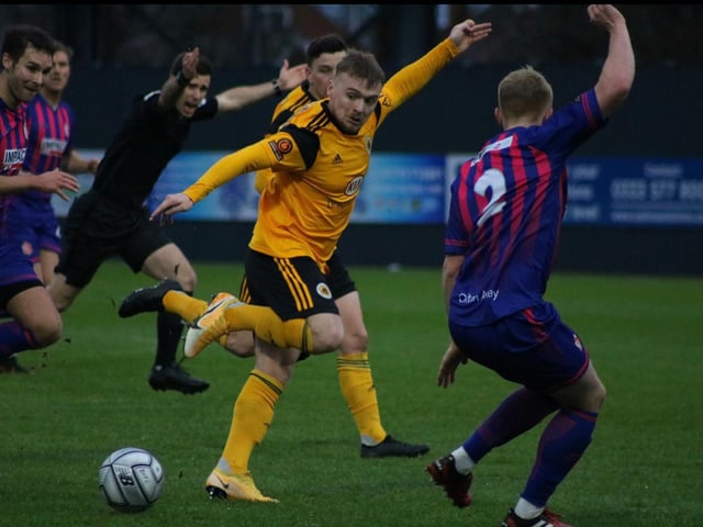 The Reds appeal for offside. Photo: Oliver Atkin