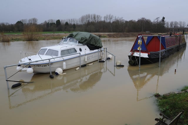 Many  boats have been left inaccessible after the River Nene burst its bank upstream of Orton Mere lock. Picture: David Lowndes