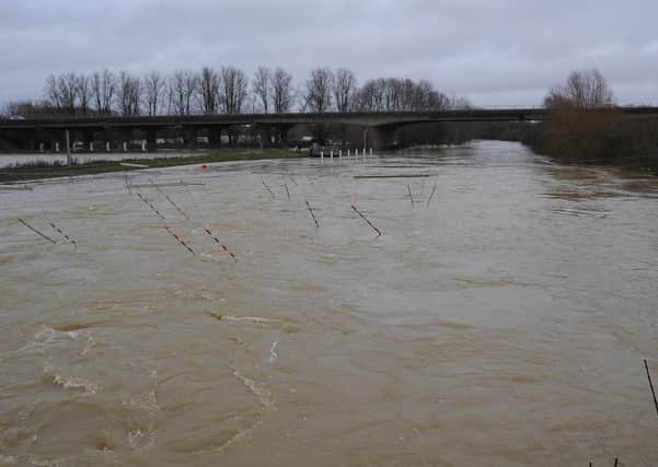 The River Nene burst its bank upstream of Orton Mere lock in Peterborough.  Picture: David Lowndes