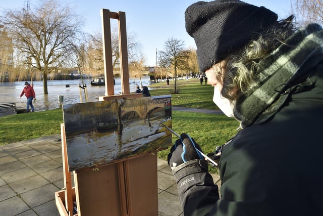 An artist captures the flooded scene on the Embankment. Picture: David Lowndes