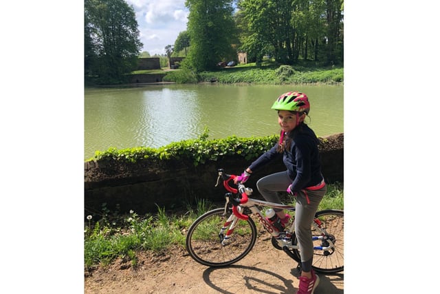 A Banbury area school girl cycled more than 300 miles for charity during the first Covid-19 lockdown over the summer. Jorgie Gillett, a then 8-year-old pupil from Middleton Cheney Primary School, launched a cycle challenge on May 1 to benefit the charity, Dementia Oxfordshire. She smashed her 250-mile target and cycled 331 miles between May 1 and August 31. She also smashed her £250 fundraising target and raised £798 for Dementia Oxfordshire. Jorgie's mother, Esme, said: "We’re really proud that she wants to raise money for others during this unsettling time. It's great she wants to get out on the bike rather than sitting around, watching TV. She cycled around the local villages with her dad (Michael Gillett), who is a member of Banbury Star Cycling Club. Her longest ride was 18 miles, and she managed to do it in a impressive 1 hour 32 minutes." (photo submitted by the family)