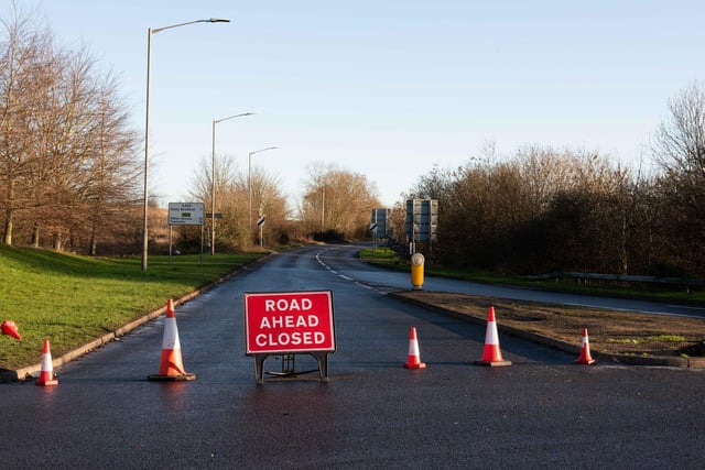 Road closures were in place to stop people driving through water