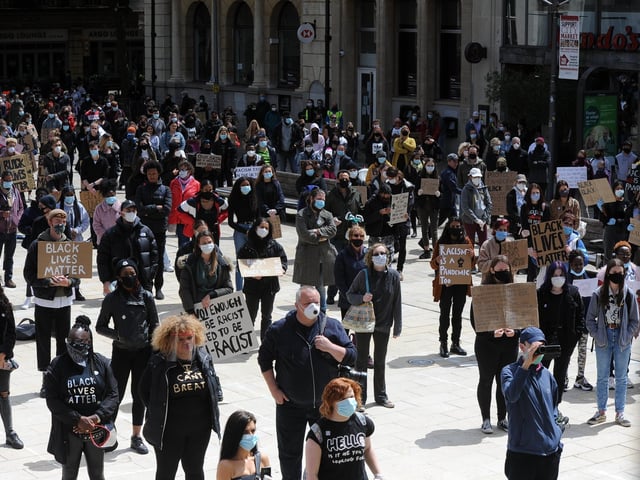 Hundreds truned out to a socially-distanced sit down Black Lives Matters protest in Cathedral Square in July.